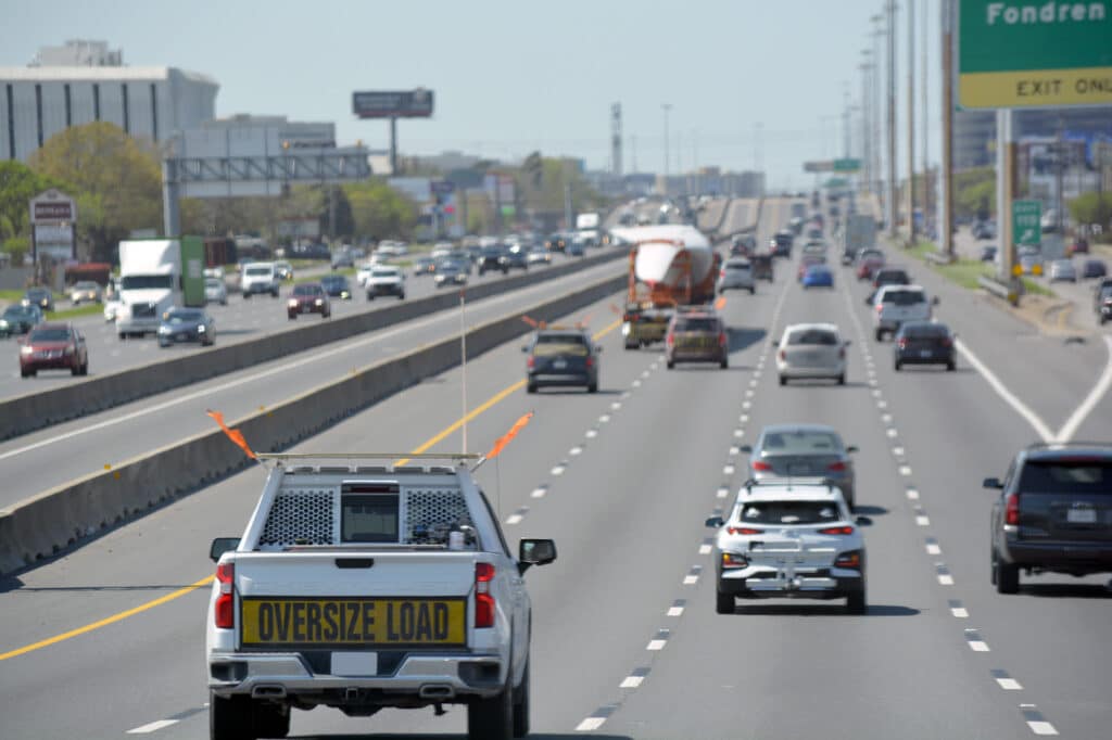 Pilot car and wind load on the freeway